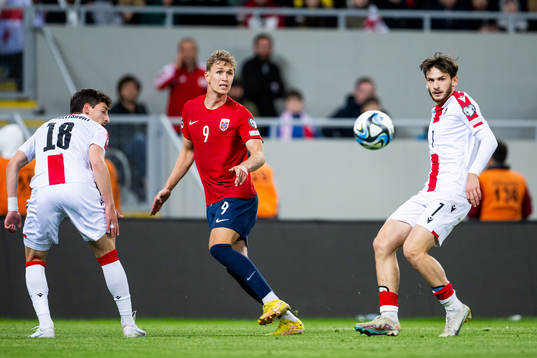 Ola Solbakken of Norway and Khvicha Kvaratskhelia of Georgia