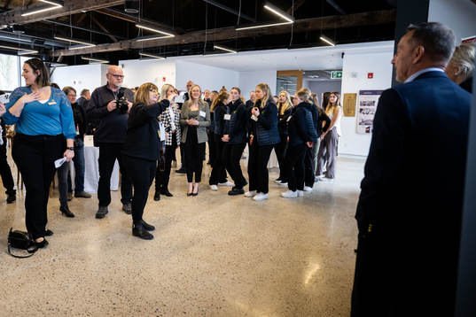 Players of Sweden at an event with the mayor of Aurora