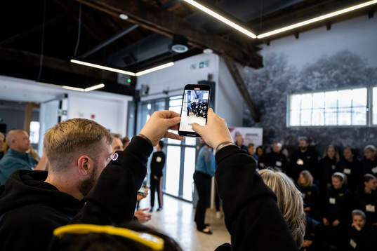 Players and leaders of Sweden at an event with the mayor of