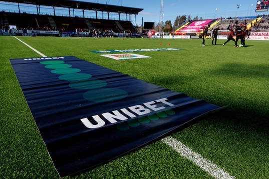 En matta med Unibets logga på