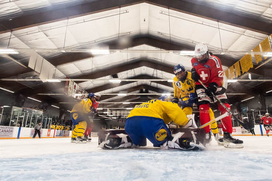 Goaltender Emma Söderberg and Hanna Olsson of Sweden and