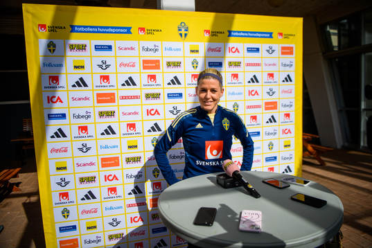 Olivia Schough is interviewed by the media