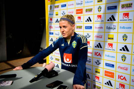 Olivia Schough is interviewed by the media