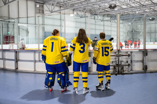 Goaltender Sara Grahn, Anna Kjellbin and Lisa Johansson of