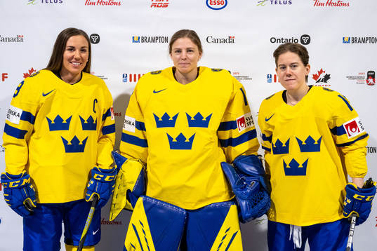 Anna Kjellbin, goaltender Sara Grahn  and Lisa Johansson of