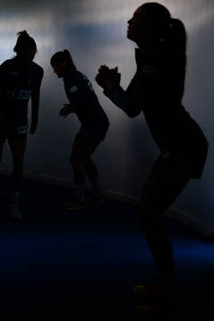 The silhouettes of Caroline Graham Hansen, Maren Mjelde and
