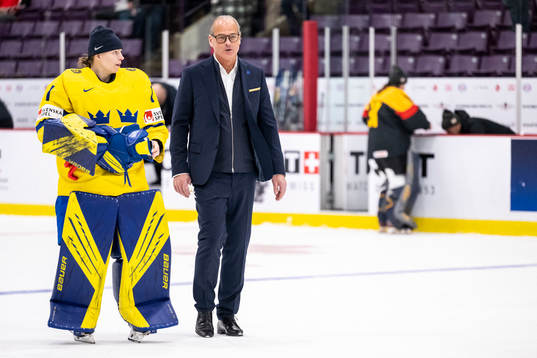 Goaltender Sara Grahn of Sweden  and assistant coach