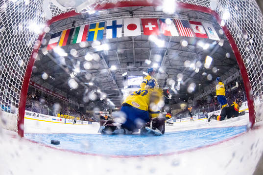 Celina Haider of Germany scores behind goaltender Emma