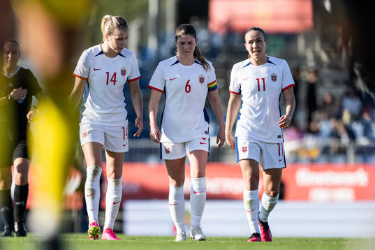 Ada Hegerberg, Maren Mjelde and Guro Reiten of Norway at