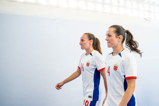 Marit Bratberg Lund and Tuva Hansen of Norway at half-time