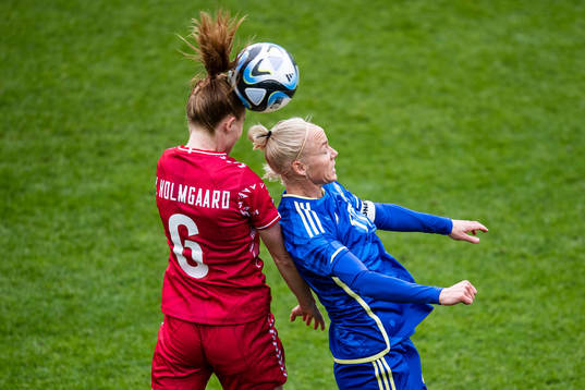 Karen Holmgaard of Denmark and Caroline Seger of Sweden