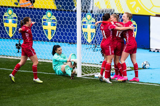 Stine Larsen of Denmark celebrates with team mates