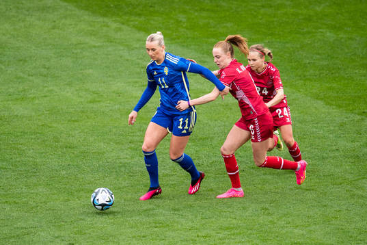 Stina Blackstenius of Sweden against Karen Holmgaard and