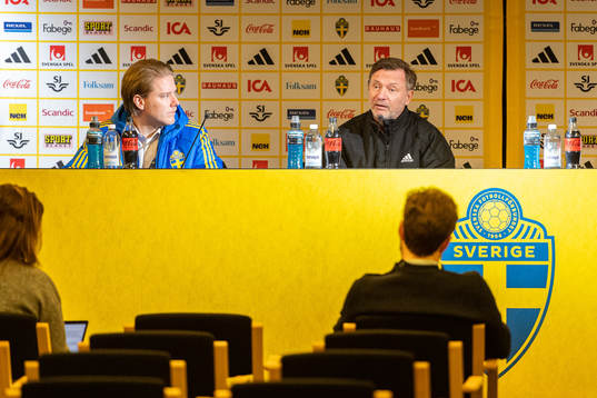 Press officer Johan Madenstam and Head coach Peter