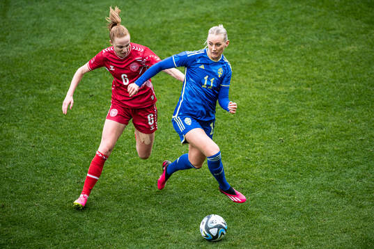 Karen Holmgaard of Denmark and Stina Blackstenius of Sweden