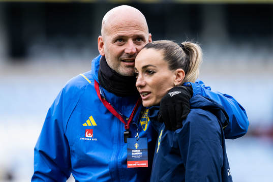 Assistant coach Magnus Wikman and Kosovare Asllani of Sweden