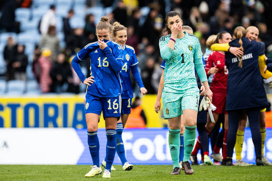 Filippa Angeldahl and goalkeeper Zecira Musovic of Sweden