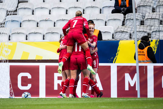 Stine Larsen of Denmark celebrates with team mates