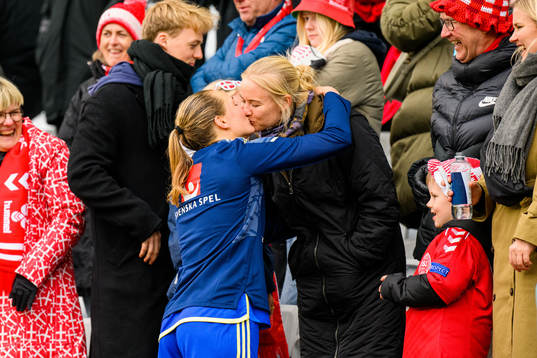 Magdalena Eriksson of Sweden kiss girlfriend Pernille Harder