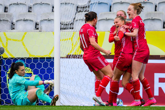 Stine Larsen of Denmark celebrates with her teammates