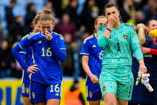 Filippa Angeldahl and goalkeeper Zecira Musovic of Sweden