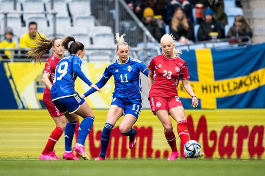 Stina Blackstenius of Sweden and Sofie Svava of Denmark
