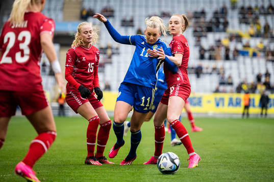 Stina Blackstenius of Sweden against Kathrine Kuhl and