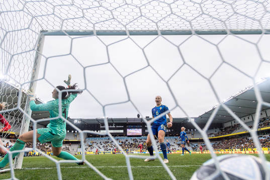 Stine Larsen of Denmark (not pictured) scores the 0-1 goal