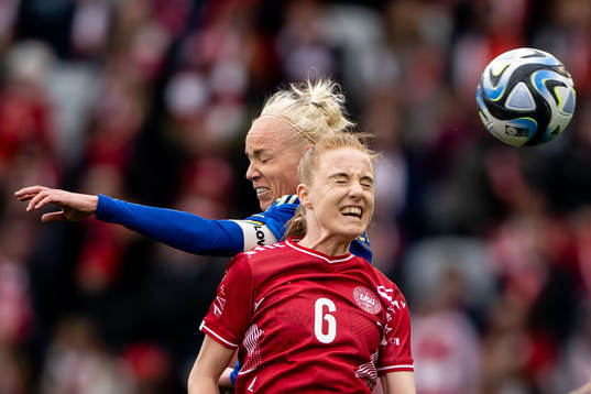 Caroline Seger of Sweden and Karen Holmgaard of Denmark