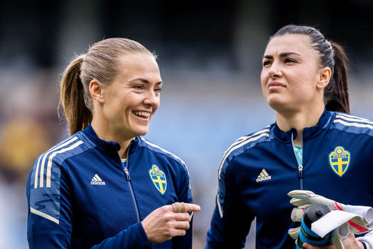 Magdalena Eriksson and goalkeeper Zecira Musovic of Sweden