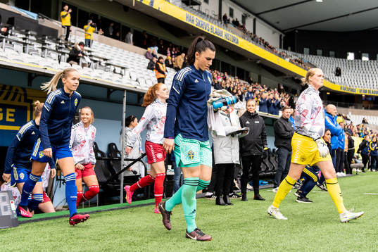 Hanna Lundkvist and goalkeeper Zecira Musovic of Sweden
