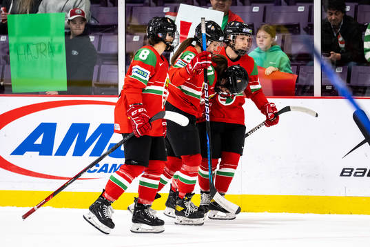 Fruzsina Mayer of Hungary gets help of the ice