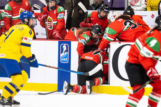 Fruzsina Mayer of Hungary gets help of the ice