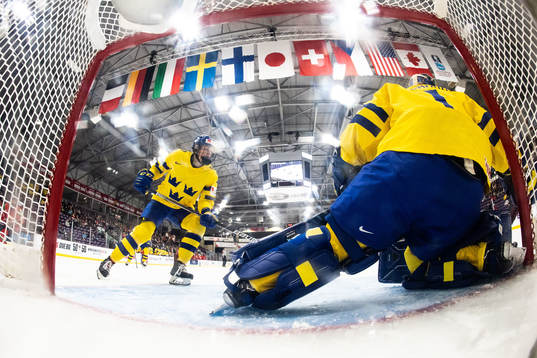Annie Silén and goaltender Sara Grahn  of Sweden