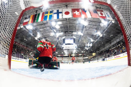 Lina Ljungblom of Sweden scores 5-2 behind goaltender Aniko
