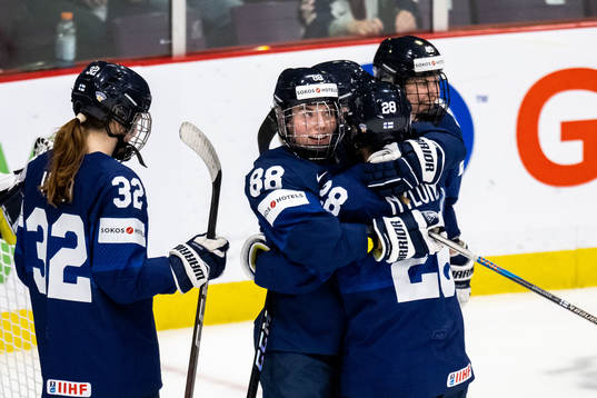 Ronja Savolainen of Finland celebrate with team mates