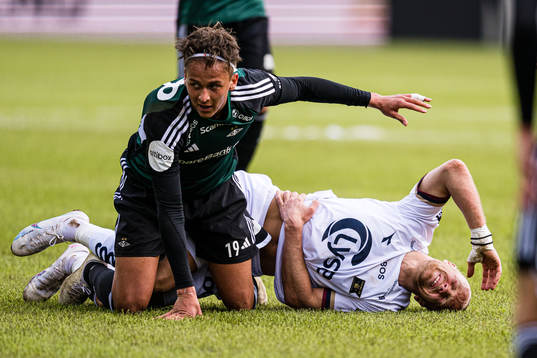 Adrian Pereira of Rosenborg and Lars-Jørgen Salvesen of