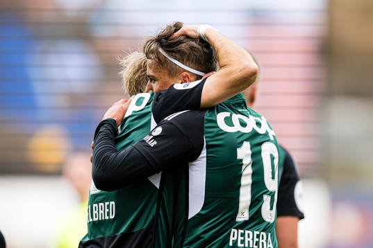 Adrian Pereira of Rosenborg celebrates with Per Ciljan
