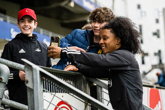 Jayden Nelson of Rosenborg taking a selfie with a fan