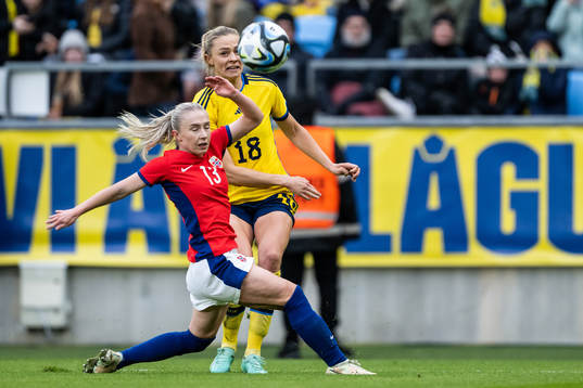 Thea Bjelde of Norway and Fridolina Rolfö of Sweden