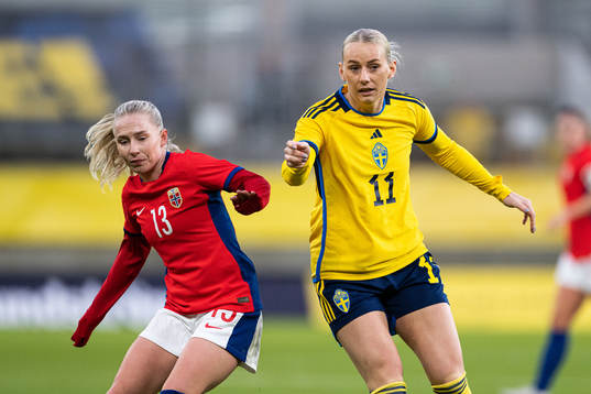 Thea Bjelde of Norway and Stina Blackstenius of Sweden