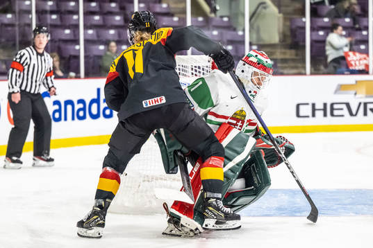 Nicola Eisenschmid of Germany and goaltender Aniko Nemeth
