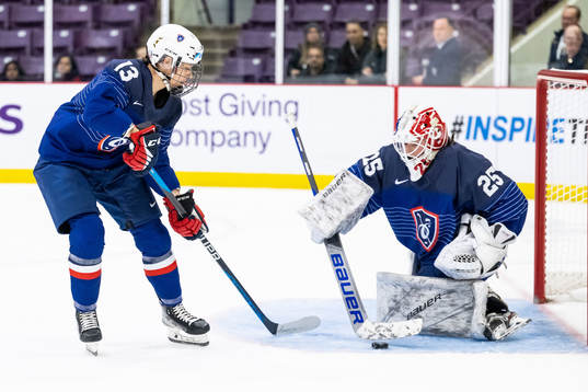 Marie-Pierre Pelissou and goaltender Caroline Lambert of