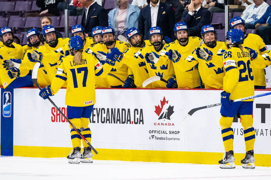Players of Sweden celebrate