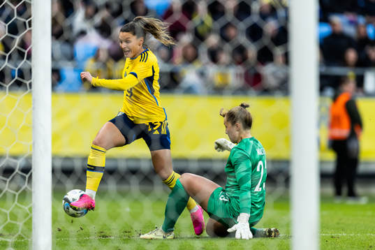 Johanna Rytting Kaneryd of Sweden and goalkeeper Aurora