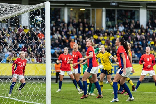Mathilde Harviken of Norway watch as Nathalie Björn of