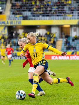 Thea Bjelde of Norway and Stina Blackstenius of Sweden