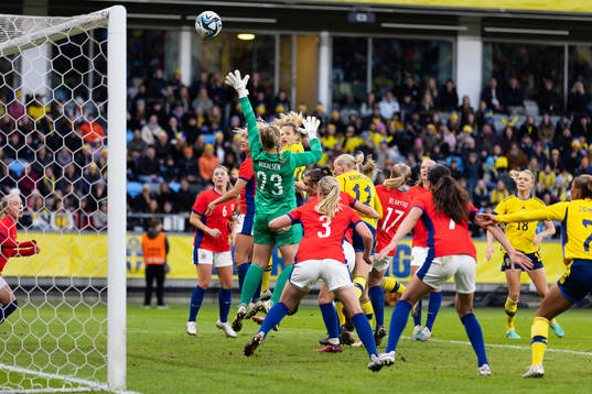 Nathalie Björn of Sweden scores 2-2 with a header