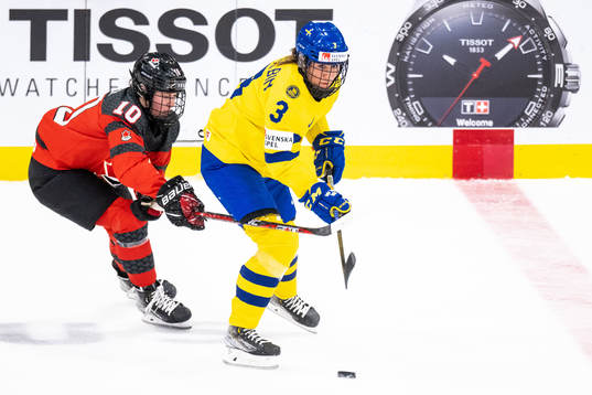 Sarah Fillier of Canada and Anna Kjellbin of Sweden