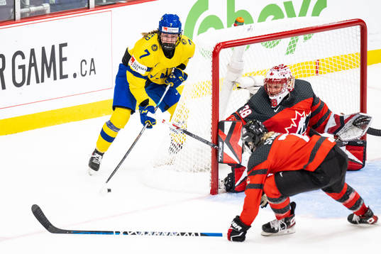 Mira Jungåker of Sweden and goaltender Emerance Maschmeyer